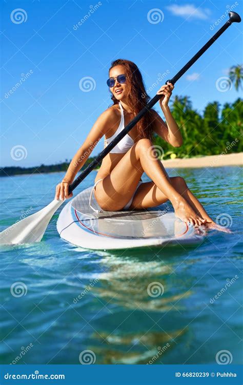 Recreational Sports. Woman Stand Up Paddle Boarding ( Surfing ). Stock Image - Image of sport ...