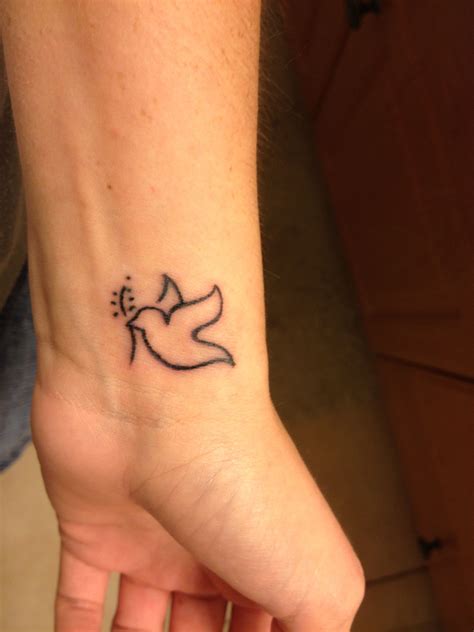 Dove wrist tattoo :) nice and simple just got this and i LOVE it ...