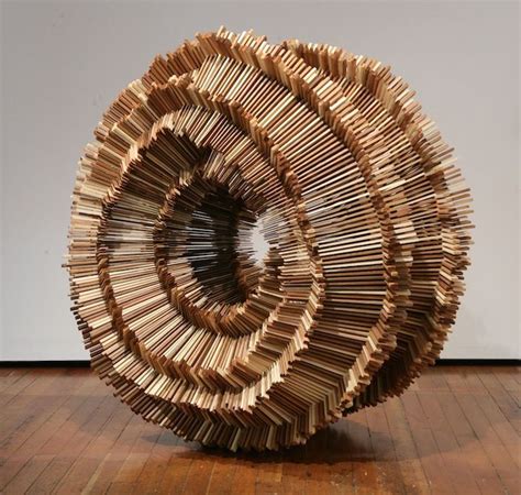 Hundreds of Pieces of Stacked Wood Form Beautifully Organic Sculptures | Organic sculpture, Wood ...