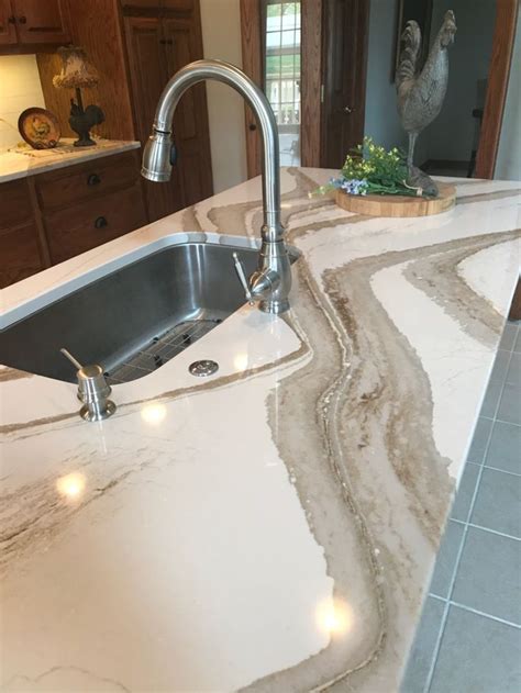 These beautiful Cambria Quartz Countertops in Brittanicca Gold go ...