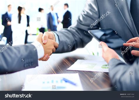 Business People Shaking Hands Stock Photo 140871454 : Shutterstock