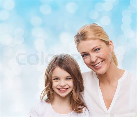 smiling mother and little girl | Stock image | Colourbox