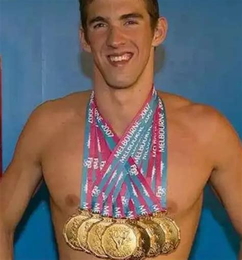 Michael Phelps Wearing 22 Medals