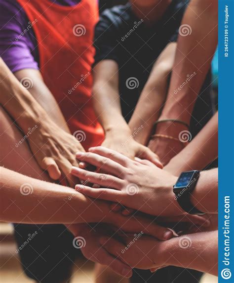 Team of Kids Children Basketball Players Stacking Hands in the Court, Sports Team Together ...