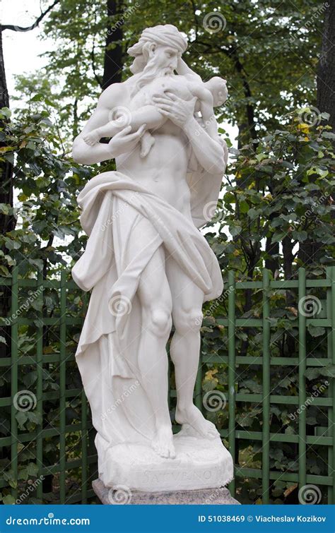 Statue Of Saturn In A Summer Garden Stock Photo - Image: 51038469