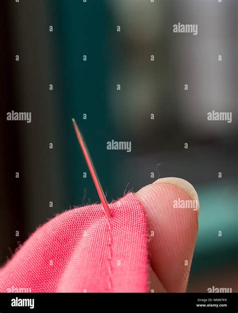 Sewing Cloth Showing Stitches Seamstress And Clothing Stock Photo - Alamy