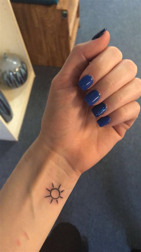 Sun Tattoo Wrist