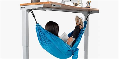 This Under-Desk Hammock Will Let You Nap in the Office, Because Sometimes You Just Can’t Work ...