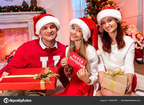 Happy family on christmas — Free Stock Photo © AllaSerebrina #164983760