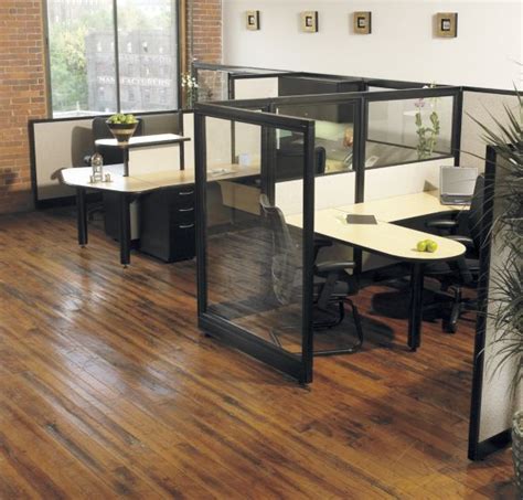 Separate cubicles with glass partition allows for noise reduction and ...