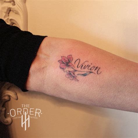 Color Flower With Name Tattoo – The Order | Name tattoos on wrist, Name flower tattoo, Tattoos ...