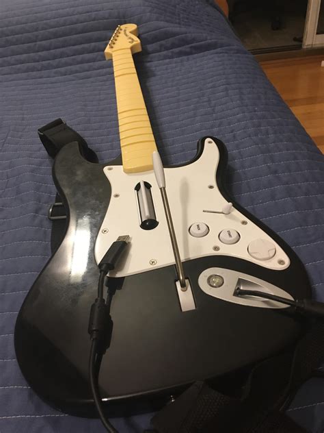 Can I play rock band 4 in the PS4 with an Xbox guitar with the usb cable? This one: : r/Rockband