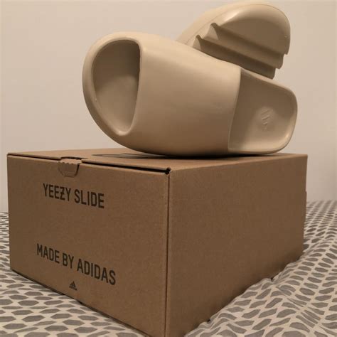 Yeezy Slides 'Desert Sand' - SneakerCool.com