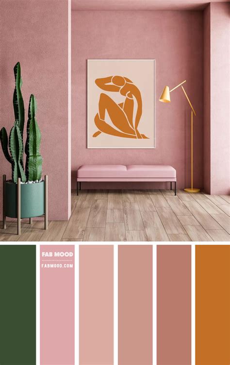 a living room with pink walls and wood flooring in shades of peach, green, brown