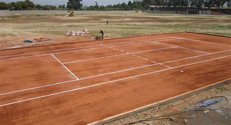 Venta e Instalacion Cancha de Tenis con polvo de ladrillo y arcilla roja