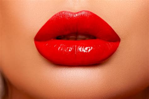 Red Lip gloss. Beautiful natural lips Red color. Sexy Lips. Beautiful Make-up Closeup. Lip Gloss ...