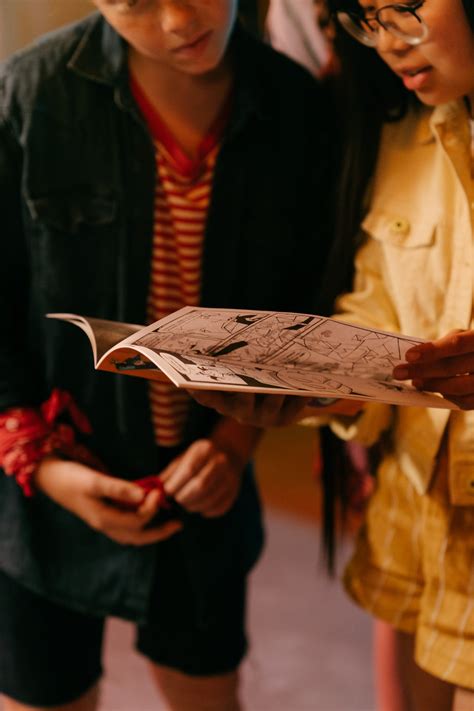 Person Holding White Printer Paper · Free Stock Photo