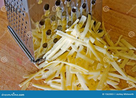 Grating Cheese stock image. Image of pile, shredded, cheese - 1562003