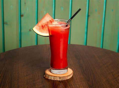 Premium Photo | A glass of watermelon juice shake with raw watermelon ...