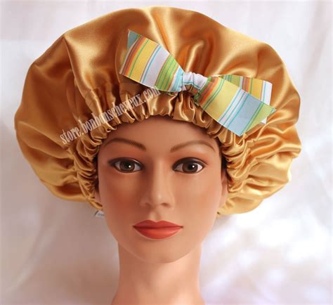 Our 100% Charmeuse Satin Taffy BonBons bonnets are handmade and have a decorative ribbon bow ...