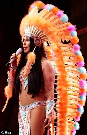 Cher reincarnates her Native American-themed costume from 1973's Half ...