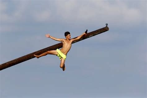 The Game of Gostra – Running Up a Greasy Wooden Pole in Malta