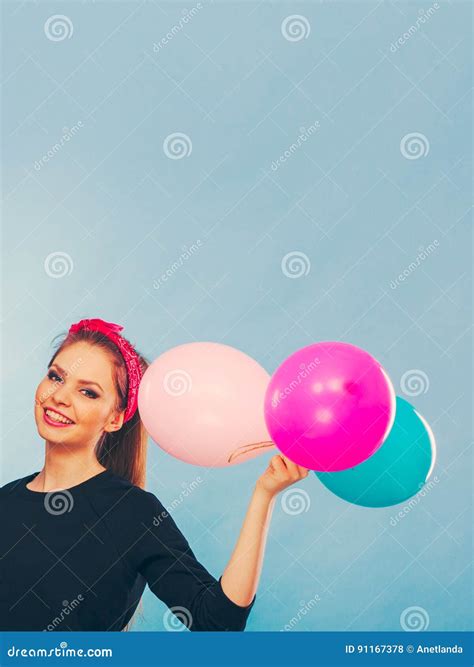 Lovely Smiling Girl Holds Colorful Balloons. Stock Photo - Image of ...