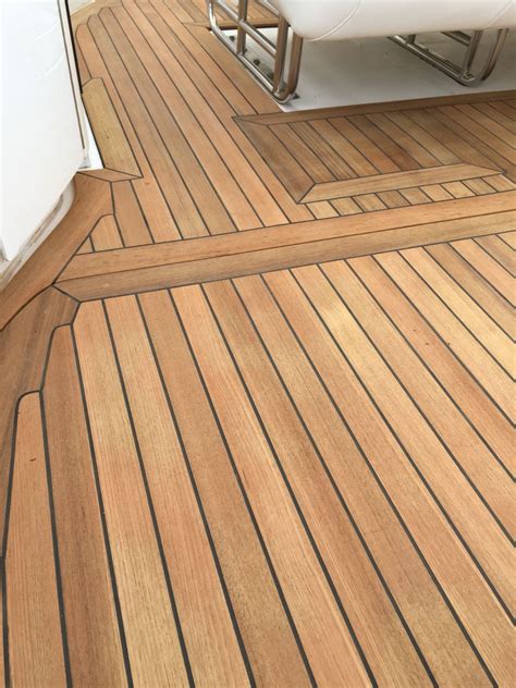 New teak decking cockpit on Fountain go fast boat | Boat flooring ideas ...