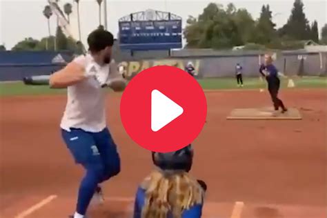 Softball Pitcher Embarrasses Football Team, Then the Punter Does the Unthinkable - FanBuzz