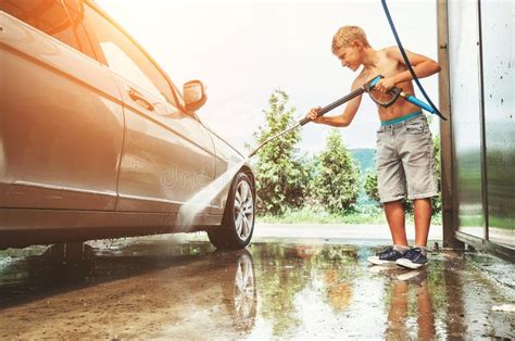 Boy helps to wash a car stock image. Image of childhood - 122713493