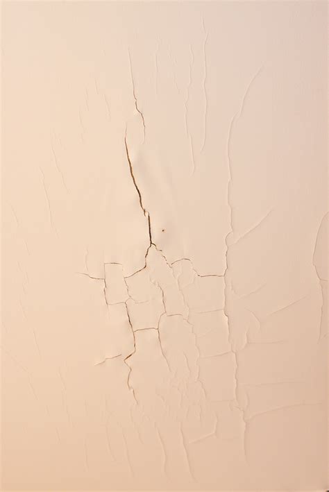 Cracked Paint on Ceiling from Water Damage - Valley Roofing