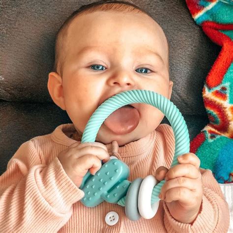 Ritzy Rattle® with Teething Rings - Rainbow | Mom survival kit, New mom survival kit, Baby ...
