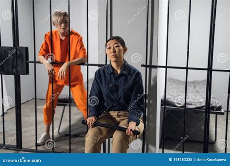A Normal Day in a Women`s Prison, a Female Warden is on Guard for a Female Criminal Stock Image ...