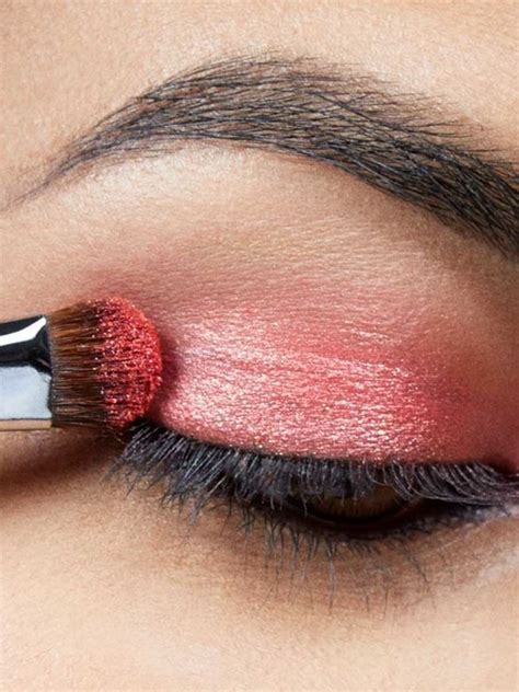 Learn how to use red lipstick as eyeshadow to create a colorful, pigmented red glitter eyeshado ...
