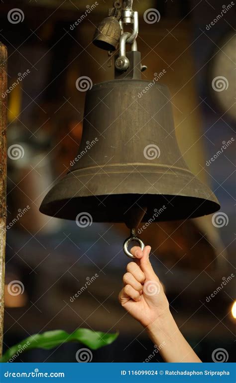 Hand ringing the bell stock photo. Image of close, metal - 116099024