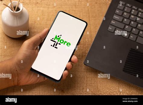 More4 logo on phone screen stock image Stock Photo - Alamy