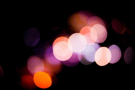 Free stock photo of blurry background, city lights, gold-tone