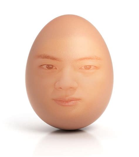 an egg shaped like a man's face is shown with the image of a woman's head