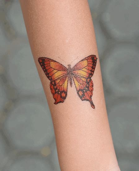 Share more than 75 orange butterfly tattoo latest - in.cdgdbentre