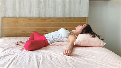 8 Yoga Poses You Can Do In Bed Before You Sleep | DoYou | Easy yoga ...