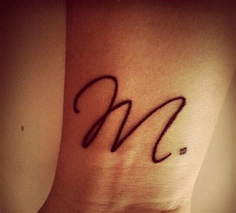 20 Elegant 'M' Letter Tattoo Designs for Timeless Appeal