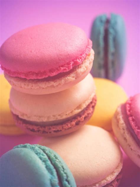 Colorful pastel macarons in vintage style. Sweet macarons with pastel ...