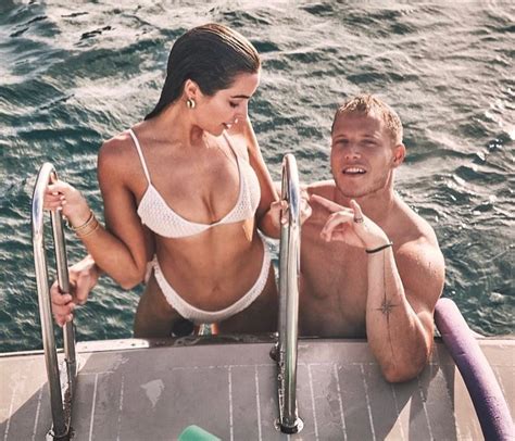 NFL star Christian McCaffrey BITES model girlfriend Olivia Culpo as pair push Instagram PDA ...