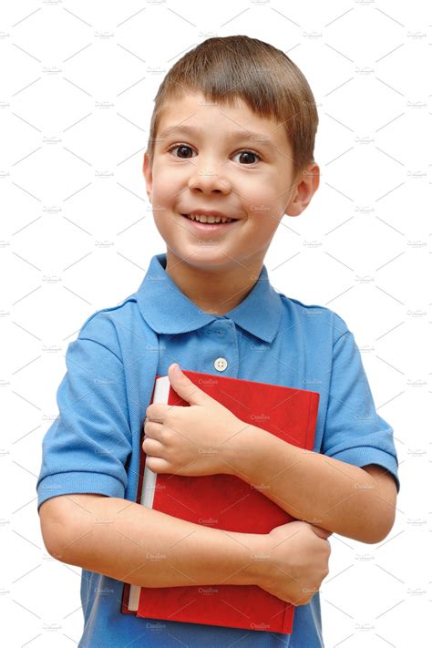 Boy holding book | People Images ~ Creative Market