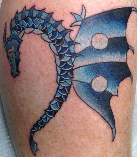 Kevin's dragon bass clef tattoo | Music tattoos, Dragon tattoo, Memorial tattoo