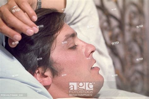 Alain Delon on the set of the film 'Diaboliquement Vôtre' (directed by ...