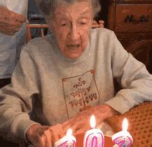 Old Woman Blowing Birthday Candles With Falling Dentures GIF | GIFDB.com