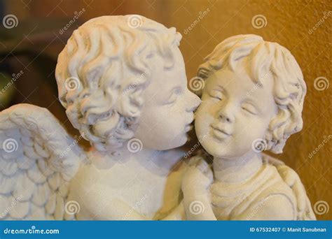 Cupid statue stock image. Image of garden, cherub, background - 67532407