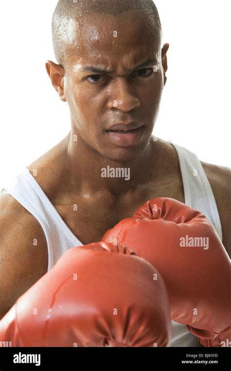 Man wearing boxing gloves Stock Photo - Alamy