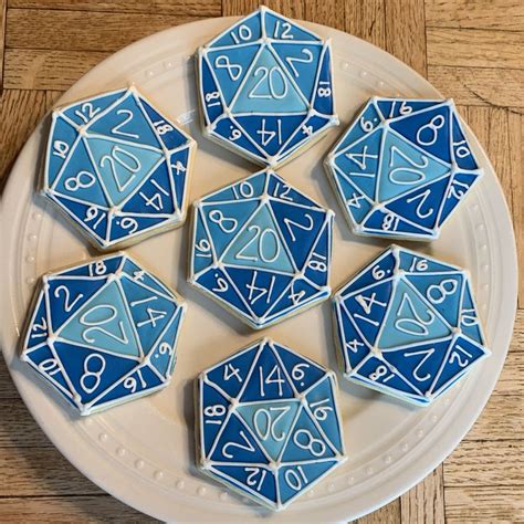 Dungeons and dragons cookies | Dragon cookies, Royal icing cookies ...